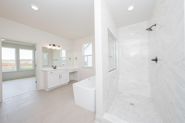 5416 Bridgemore Blvd, Murfreesboro, TN 37129 - bathroom with vanity, a marble finish shower, and a freestanding tub