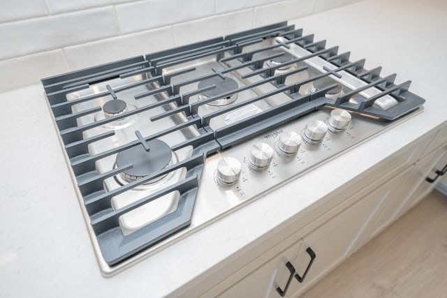 5416 Bridgemore Blvd, Murfreesboro, TN 37129 - kitchen view of stainless steel gas cooktop and backsplash