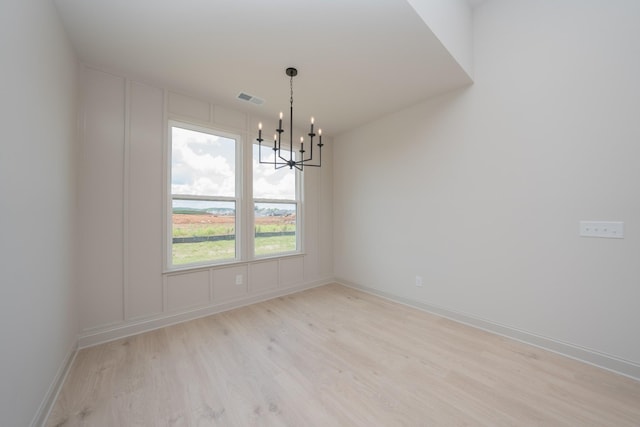 5416 Bridgemore Blvd, Murfreesboro, TN 37129 - spare room with light wood finished floors and a chandelier
