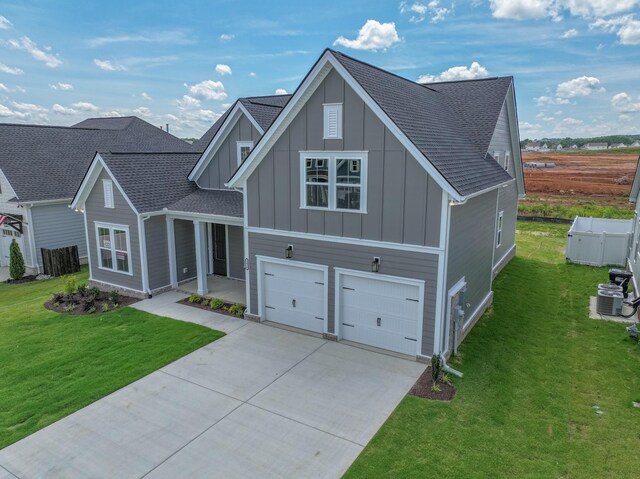 5416 Bridgemore Blvd, Murfreesboro, TN 37129 - view of front of house with board and batten siding, concrete driveway, an attached garage, and roof with shingles