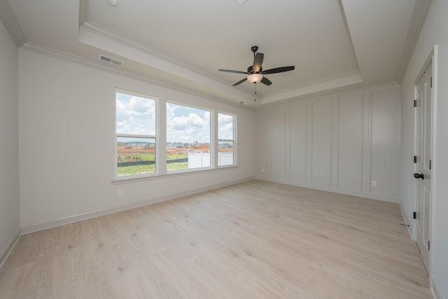5416 Bridgemore Blvd, Murfreesboro, TN 37129 - empty room with a tray ceiling, crown molding, light wood-style flooring, and ceiling fan