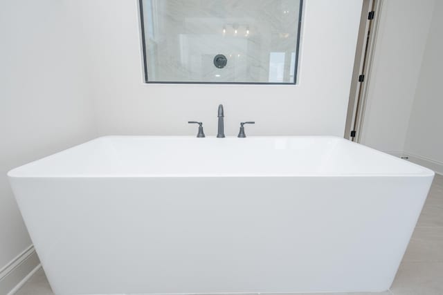 5416 Bridgemore Blvd, Murfreesboro, TN 37129 - bathroom featuring a freestanding bath and tile patterned floors