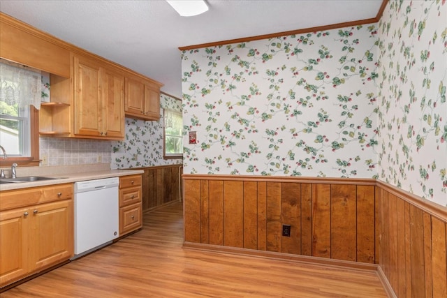 718 Midway St, Lewisburg, TN 37091 - kitchen featuring dishwasher, wallpapered walls, wainscoting, light wood-style flooring, and light countertops