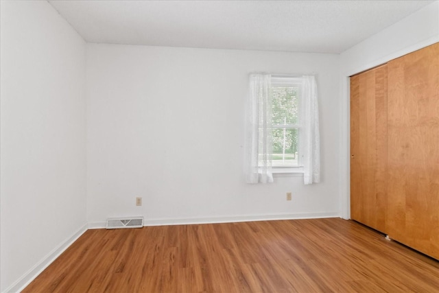 718 Midway St, Lewisburg, TN 37091 - unfurnished bedroom featuring wood finished floors and a closet