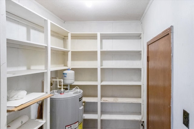 718 Midway St, Lewisburg, TN 37091 - pantry featuring electric water heater