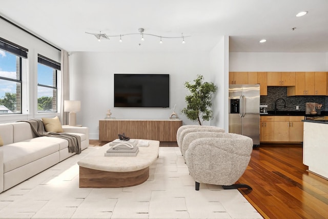 2201 8th Ave S Unit 306, Nashville, TN 37204 - living room featuring dark wood-type flooring and recessed lighting