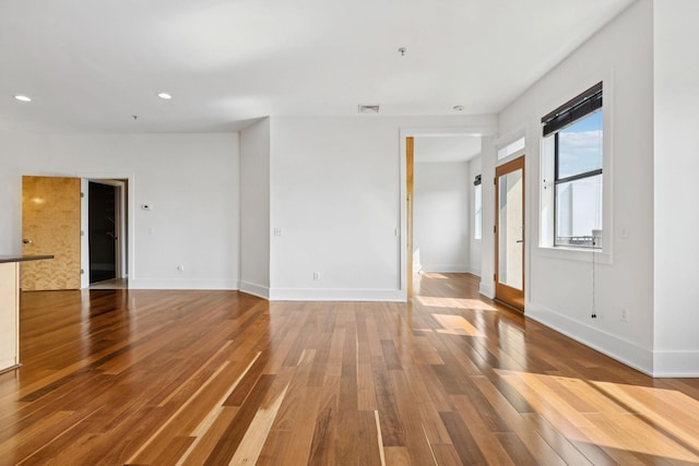 2201 8th Ave S Unit 306, Nashville, TN 37204 - spare room featuring wood finished floors and recessed lighting