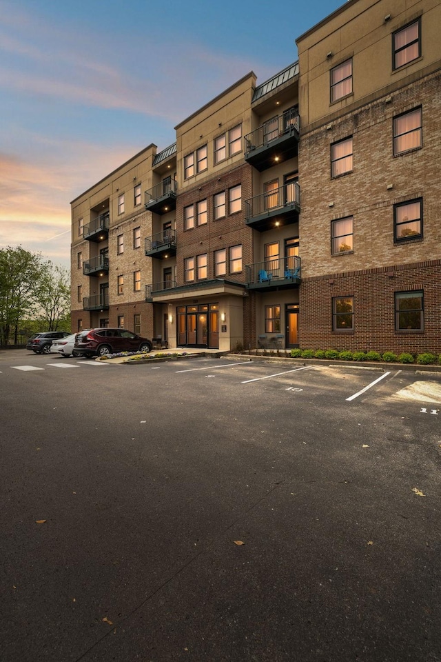 2201 8th Ave S Unit 306, Nashville, TN 37204 - view of building exterior with uncovered parking