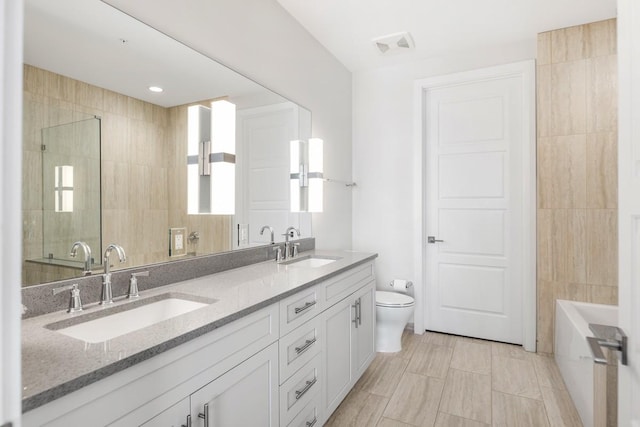 20 Rutledge St Unit 407, Nashville, TN 37210 - full bath with double vanity, a tub to relax in, and a shower