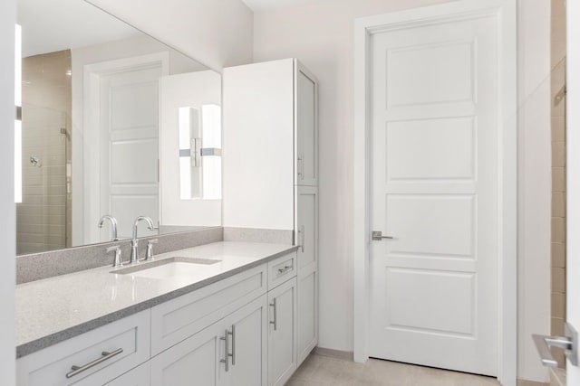20 Rutledge St Unit 407, Nashville, TN 37210 - bathroom with vanity and tiled shower