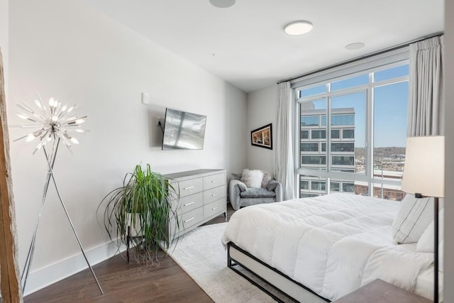 20 Rutledge St Unit 407, Nashville, TN 37210 - bedroom with wood finished floors and a chandelier