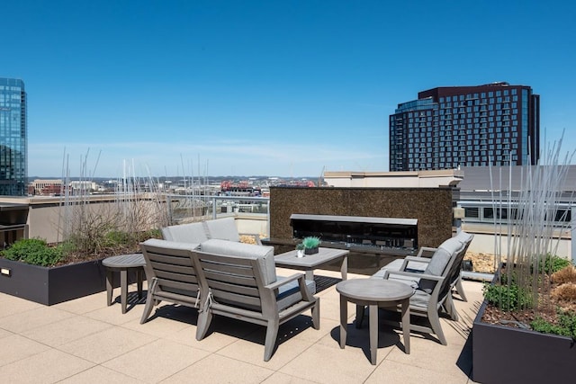 20 Rutledge St Unit 407, Nashville, TN 37210 - view of patio with an outdoor hangout area and a city view