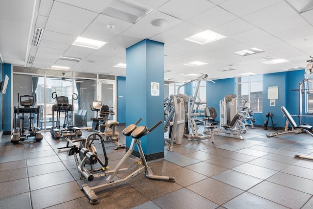 20 Rutledge St Unit 407, Nashville, TN 37210 - workout area with a drop ceiling, healthy amount of natural light, and a wall of windows