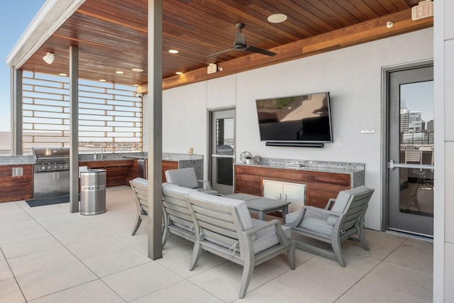 20 Rutledge St Unit 407, Nashville, TN 37210 - view of patio / terrace with an outdoor kitchen, outdoor dining area, and a ceiling fan