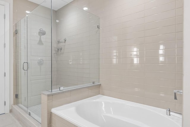 20 Rutledge St Unit 407, Nashville, TN 37210 - full bathroom with a stall shower and a bath