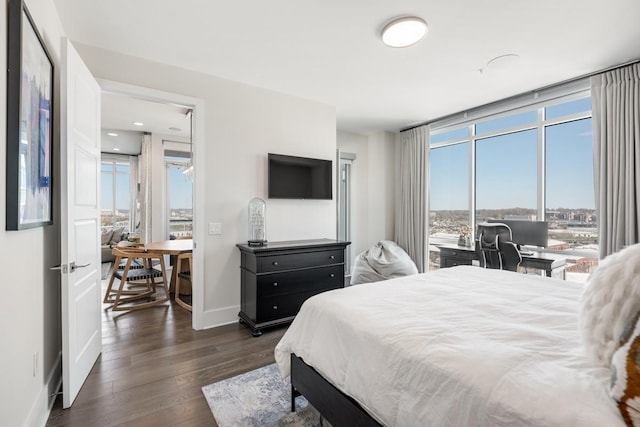 20 Rutledge St Unit 407, Nashville, TN 37210 - bedroom with dark wood-style flooring and access to exterior