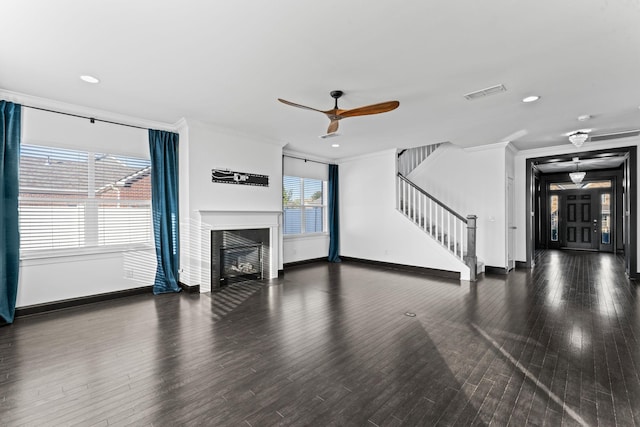 824 Promise Way, Murfreesboro, TN 37128 - unfurnished living room featuring crown molding, stairway, ceiling fan, wood finished floors, and a glass covered fireplace