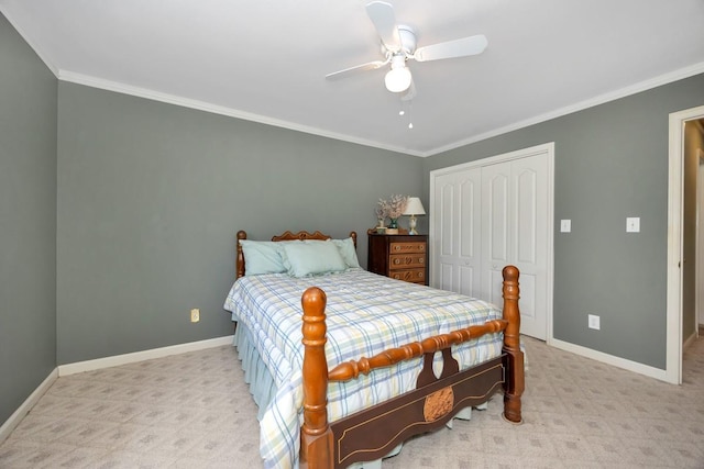 27615 Shannon Rd, Ardmore, AL 35739 - bedroom with crown molding, light colored carpet, a closet, and a ceiling fan