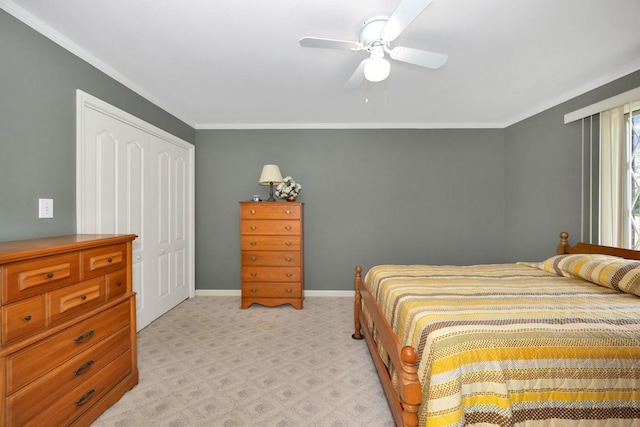 27615 Shannon Rd, Ardmore, AL 35739 - bedroom with crown molding, light carpet, ceiling fan, and a closet