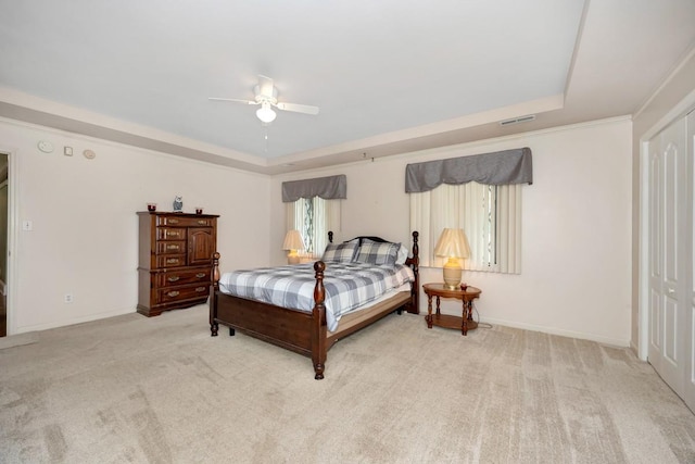 27615 Shannon Rd, Ardmore, AL 35739 - carpeted bedroom featuring a raised ceiling and a ceiling fan