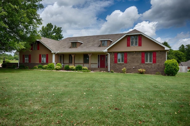 27615 Shannon Rd, Ardmore, AL 35739 - view of front facade with a front yard, brick siding, and covered porch