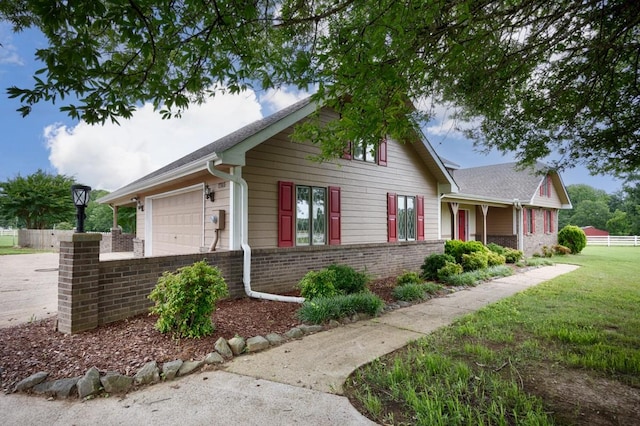 27615 Shannon Rd, Ardmore, AL 35739 - view of front of home with a garage, brick siding, and concrete driveway