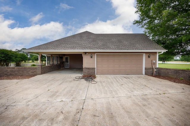 27615 Shannon Rd, Ardmore, AL 35739 - view of front of home with concrete driveway, an attached garage, brick siding, and a shingled roof