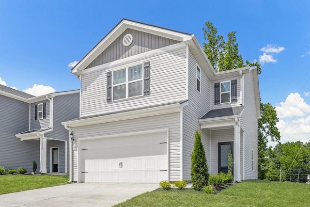 2045 Lala Loop, White Bluff, TN 37187 - traditional home with a garage, a front yard, and driveway