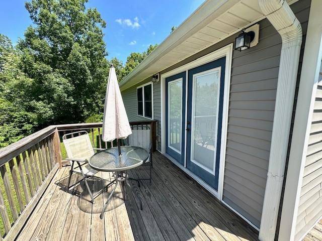 2082 Airport Ridge Rd, Linden, TN 37096 - wooden deck featuring outdoor dining space