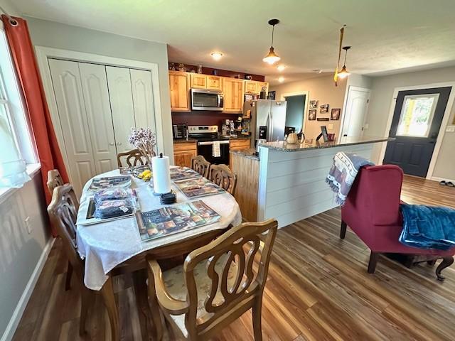 2082 Airport Ridge Rd, Linden, TN 37096 - dining room with wood finished floors and baseboards