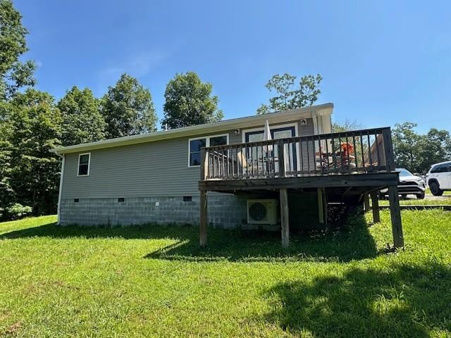 2082 Airport Ridge Rd, Linden, TN 37096 - rear view of house with a deck, crawl space, and a lawn