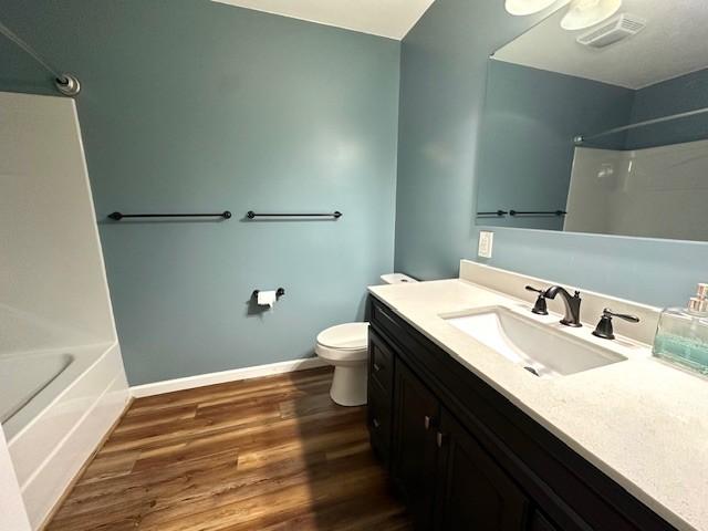 2082 Airport Ridge Rd, Linden, TN 37096 - full bath with vanity, wood finished floors, and tub / shower combination