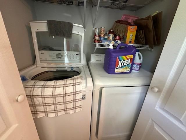 2082 Airport Ridge Rd, Linden, TN 37096 - washroom featuring washing machine and dryer
