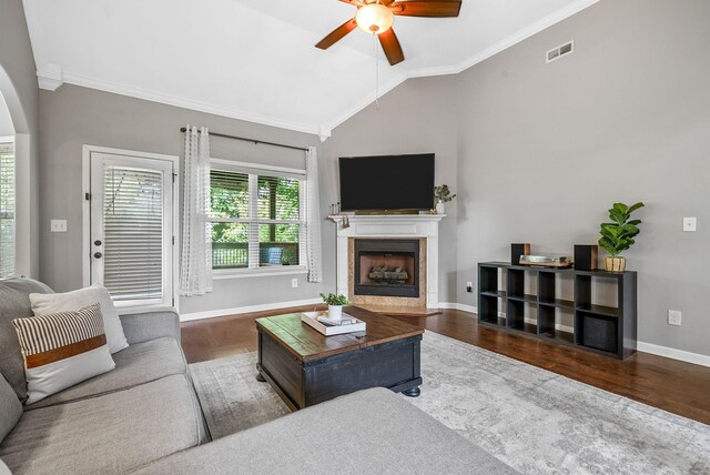1398 Raven Rd, Clarksville, TN 37042 - living room featuring vaulted ceiling, wood finished floors, ceiling fan, crown molding, and a high end fireplace