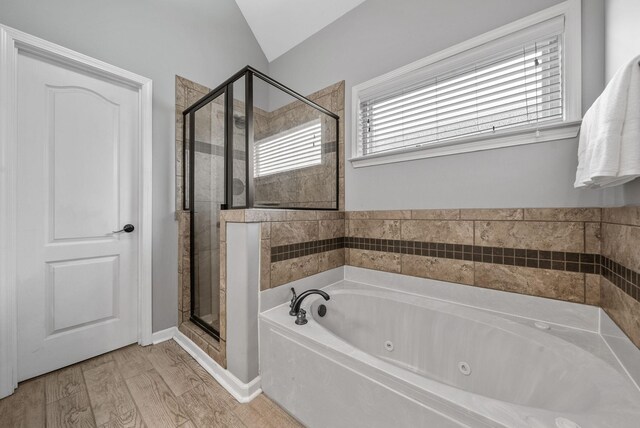 1398 Raven Rd, Clarksville, TN 37042 - full bath with a shower stall, a jetted tub, and lofted ceiling