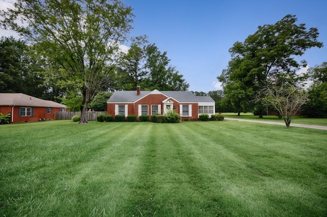 801 E Forrest St, Athens, AL 35611 - ranch-style home with a chimney