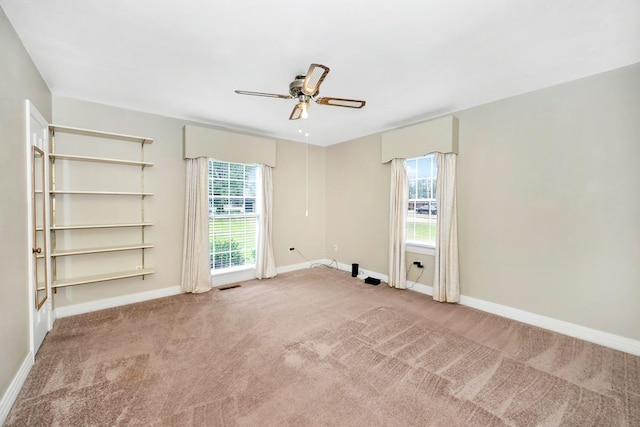 801 E Forrest St, Athens, AL 35611 - spare room featuring ceiling fan and carpet flooring