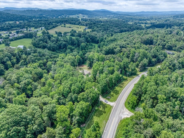 1901 Rickman Rd, Livingston, TN 38570 - aerial overview of property's location with a heavily wooded area and a mountain backdrop