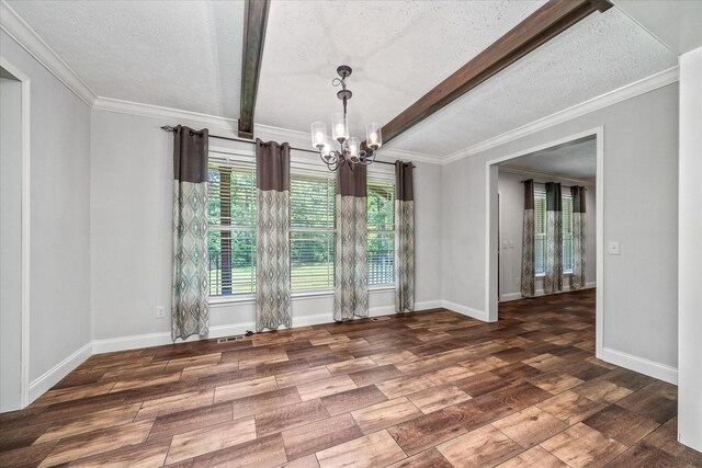 1901 Rickman Rd, Livingston, TN 38570 - empty room with a chandelier, a textured ceiling, wood finished floors, beamed ceiling, and ornamental molding
