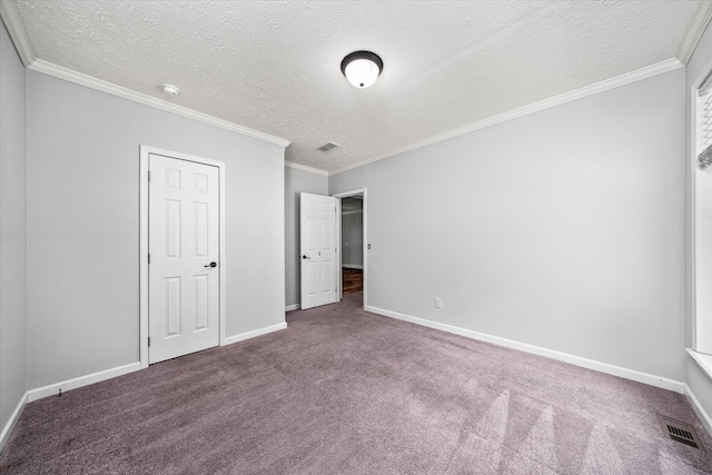 1901 Rickman Rd, Livingston, TN 38570 - unfurnished bedroom with a textured ceiling, carpet floors, and crown molding