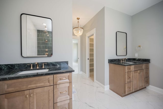 5077B Florence Rd, Murfreesboro, TN 37129 - full bath featuring marble tiled floors, two vanities, a chandelier, and a walk in closet