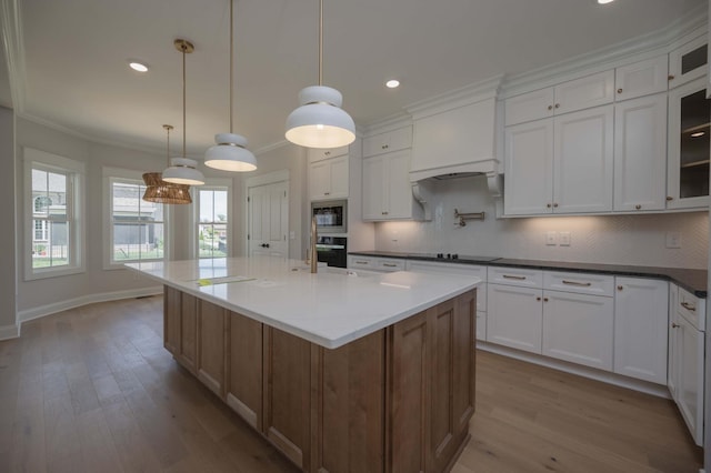 5077B Florence Rd, Murfreesboro, TN 37129 - kitchen with black appliances, wood finished floors, white cabinetry, backsplash, and ornamental molding