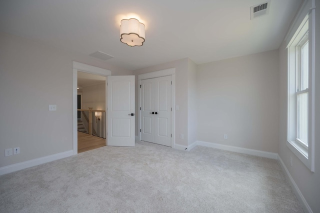 5077B Florence Rd, Murfreesboro, TN 37129 - unfurnished bedroom with light colored carpet and a closet