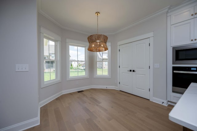 5077B Florence Rd, Murfreesboro, TN 37129 - unfurnished dining area featuring light wood-style flooring and ornamental molding