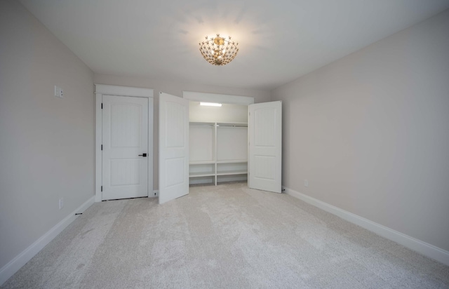 5077B Florence Rd, Murfreesboro, TN 37129 - unfurnished bedroom with light carpet, a chandelier, and a closet