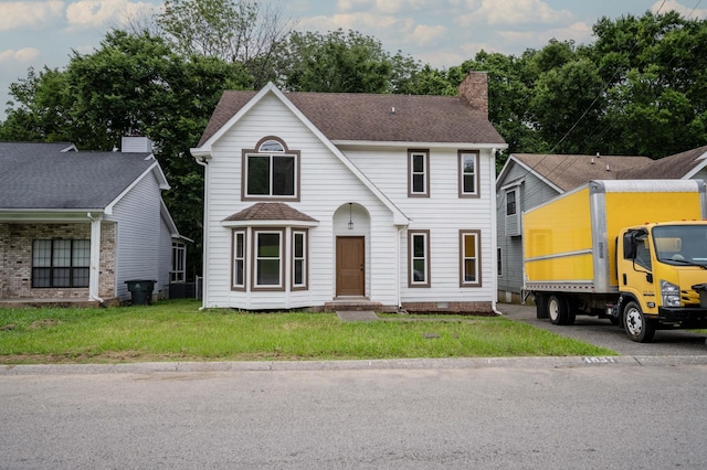4037 Calumet Dr, Antioch, TN 37013 - view of front facade featuring a chimney, a front lawn, and roof with shingles