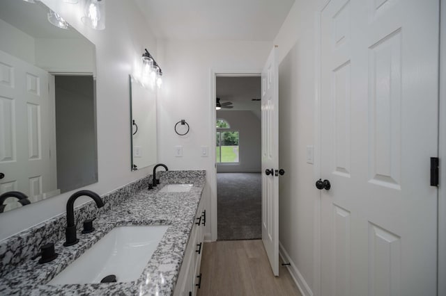 4037 Calumet Dr, Antioch, TN 37013 - full bath with double vanity and wood finished floors