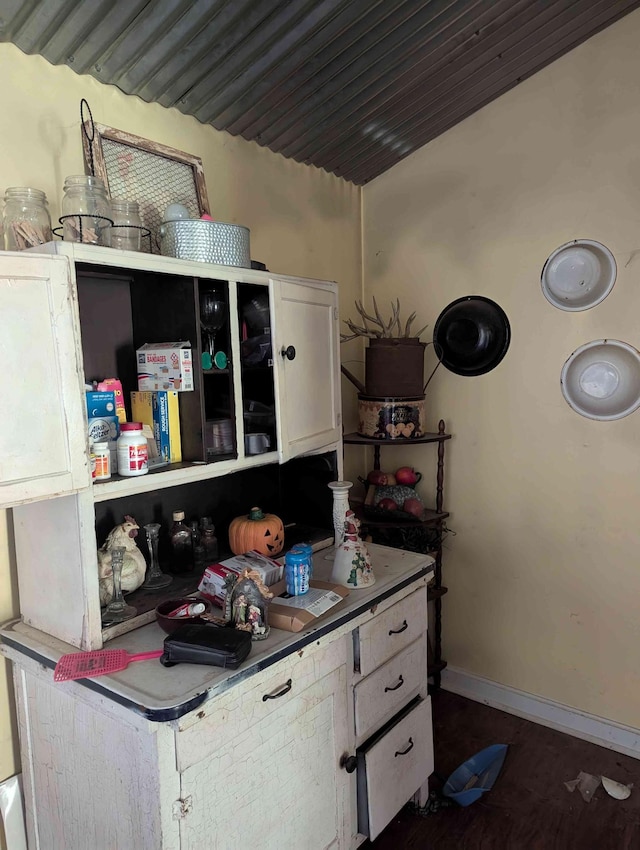 304 Fox Hollow Rd, Goodspring, TN 38460 - kitchen featuring wood finished floors and white cabinets