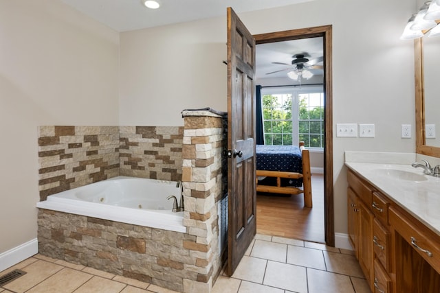 165 Kangaroo Ridge Rd, Byrdstown, TN 38549 - ensuite bathroom with tile patterned flooring, vanity, a whirlpool tub, and a ceiling fan