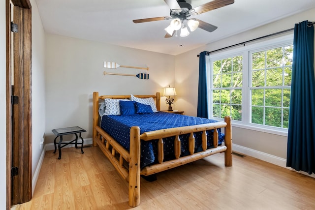 165 Kangaroo Ridge Rd, Byrdstown, TN 38549 - bedroom with light wood-style flooring and ceiling fan